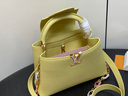capucines mm 31,5 cuir de taurillon jaune accastillage doré