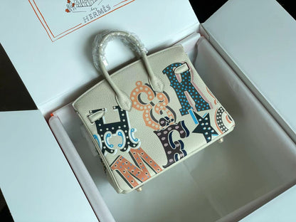 SAC BIRKIN 25 EN CUIR DE VEAU BLANC CRÈME AVEC AUTOCOLLANT COLORÉ (FABRIQUÉ SUR COMMANDE)