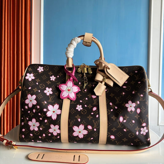 Sac bandoulière LV x TM Keepall 45 cm en toile monogrammée marron Sakura