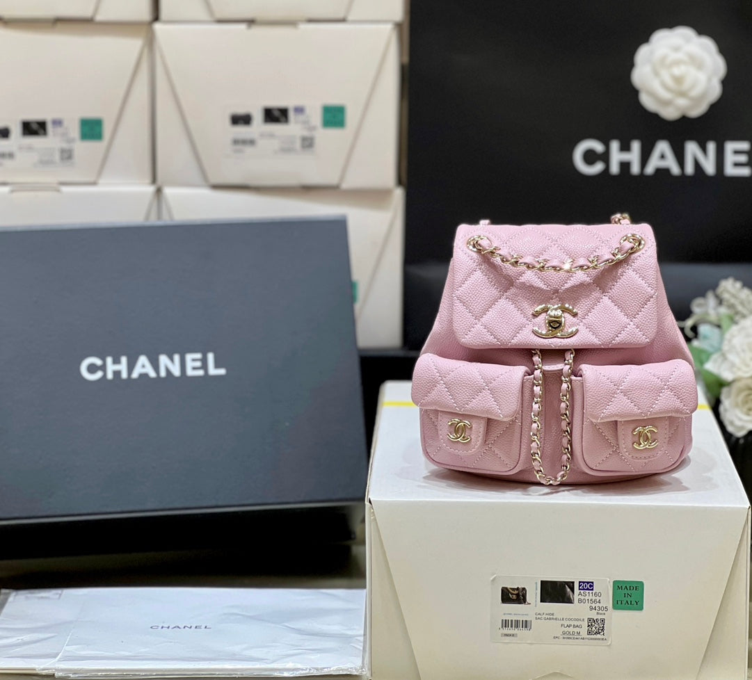 Sac à dos 24a duma en cuir caviar rose avec accessoires dorés clairs