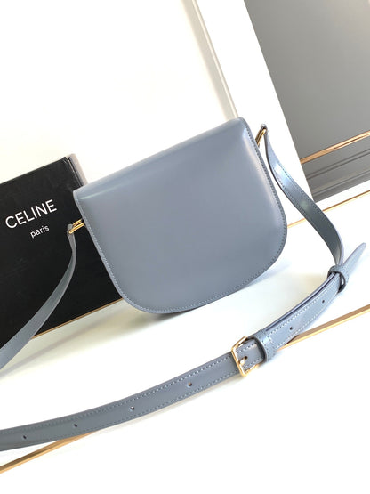 Teen Besace Triomphe 18,5 en cuir de veau gris avec finitions dorées