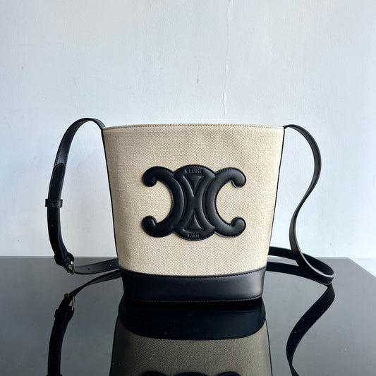PETIT SEAU CUIR TRIOMPHE 24CM EN TEXTILE RAYÉ ET CUIR DE VEAU NOIR