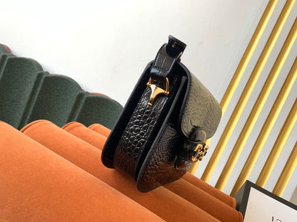 Sac à mors GG 1955 25 cm en cuir de crocodile noir et accessoires dorés