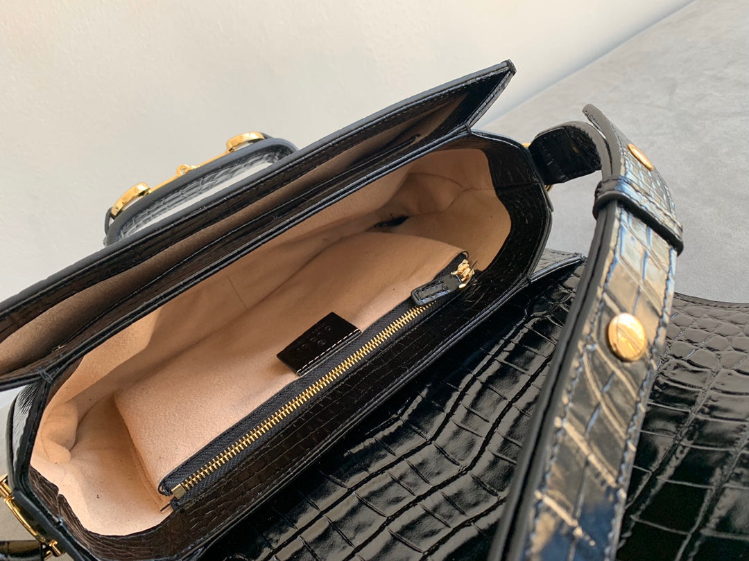 Sac à mors GG 1955 25 cm en cuir de crocodile noir et accessoires dorés