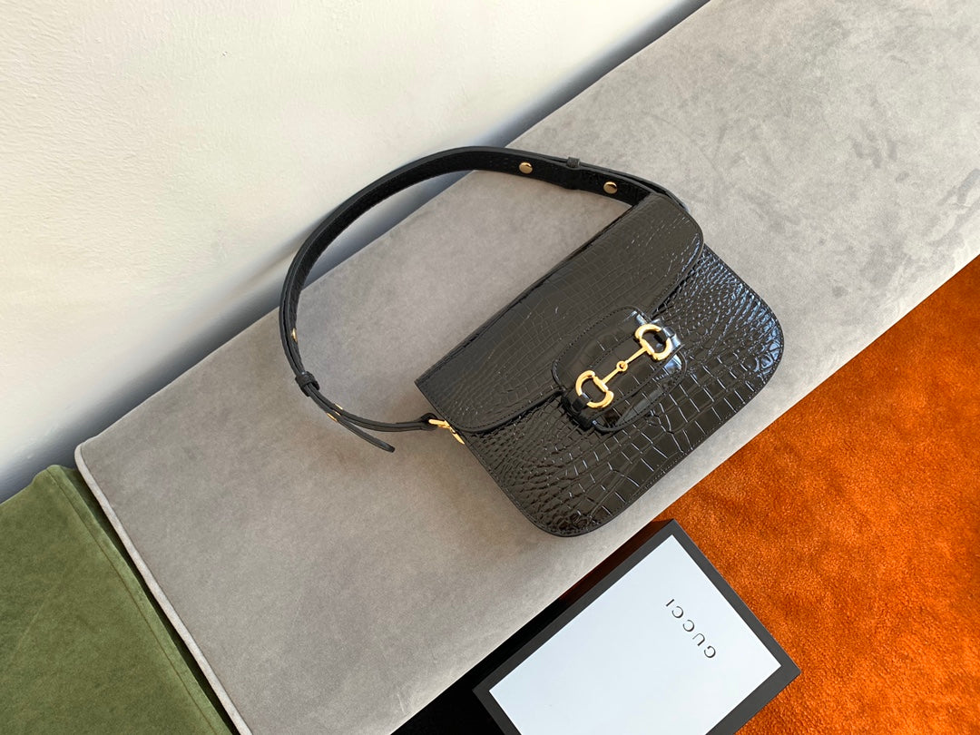 Sac à mors GG 1955 25 cm en cuir de crocodile noir et accessoires dorés