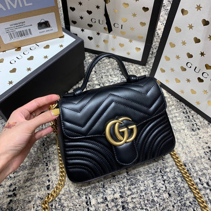 Mini-sac à main GG Marmont 21 cm en cuir de veau noir et accessoires dorés