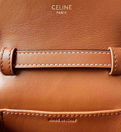 Sac à dos Teen Triomphe 11 cm en cuir de veau marron monogrammé